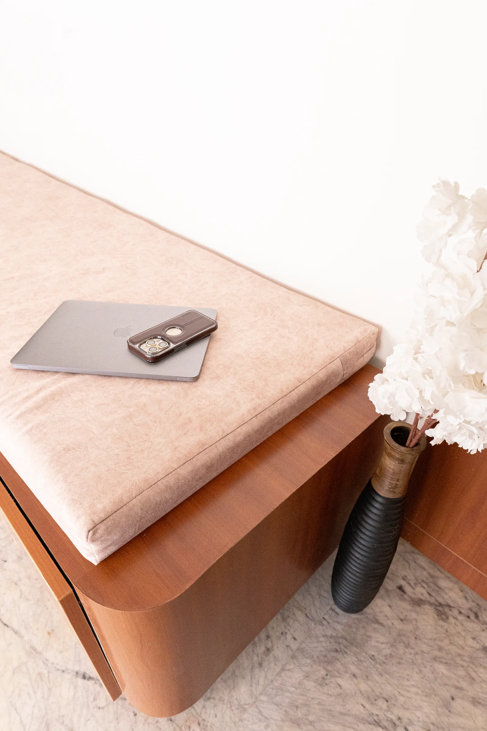 Upholstered teak storage bench detail — Karthik's Residence